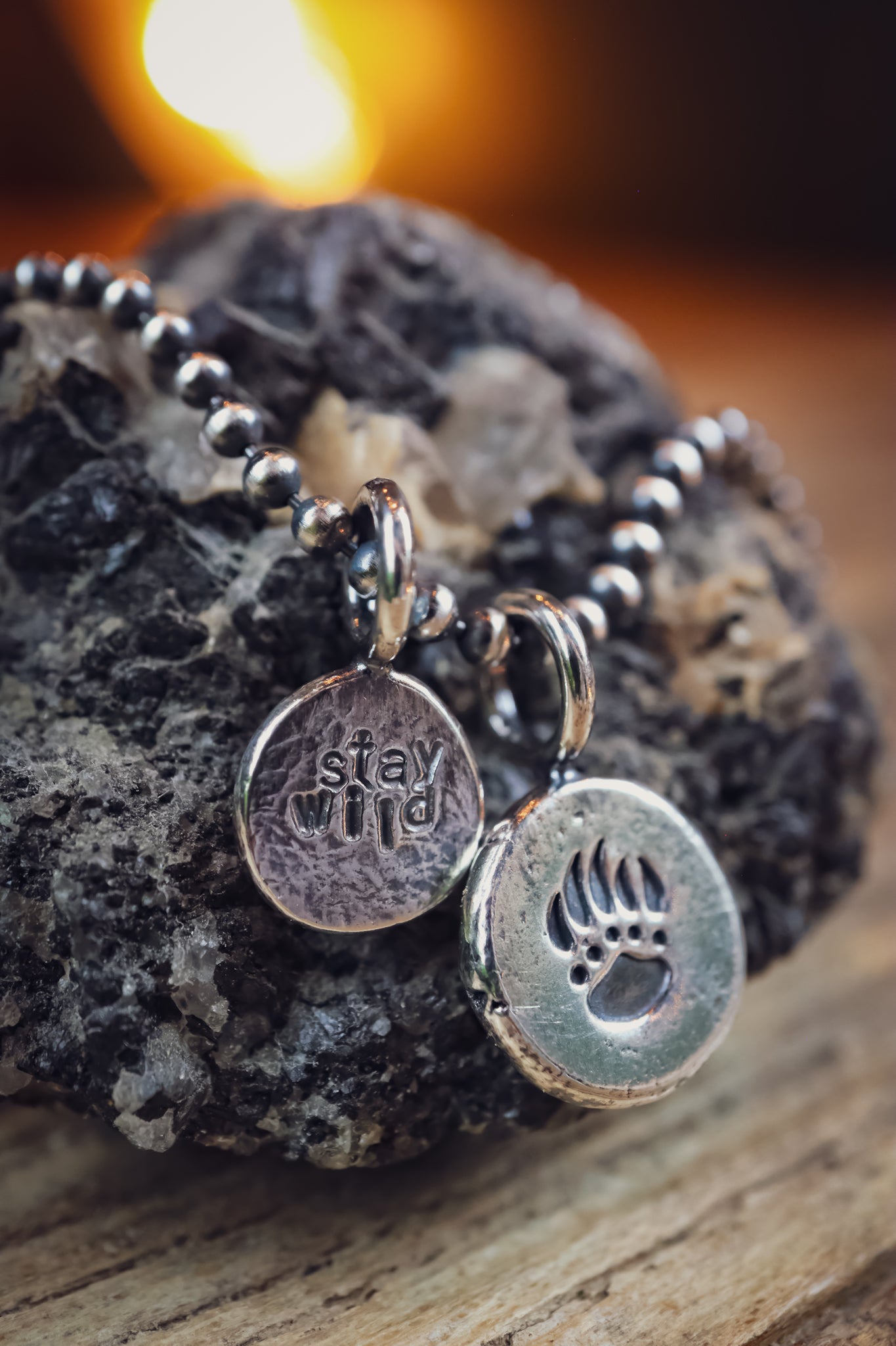 the Stay Wild Bear Track Necklace (reclaimed sterling silver)