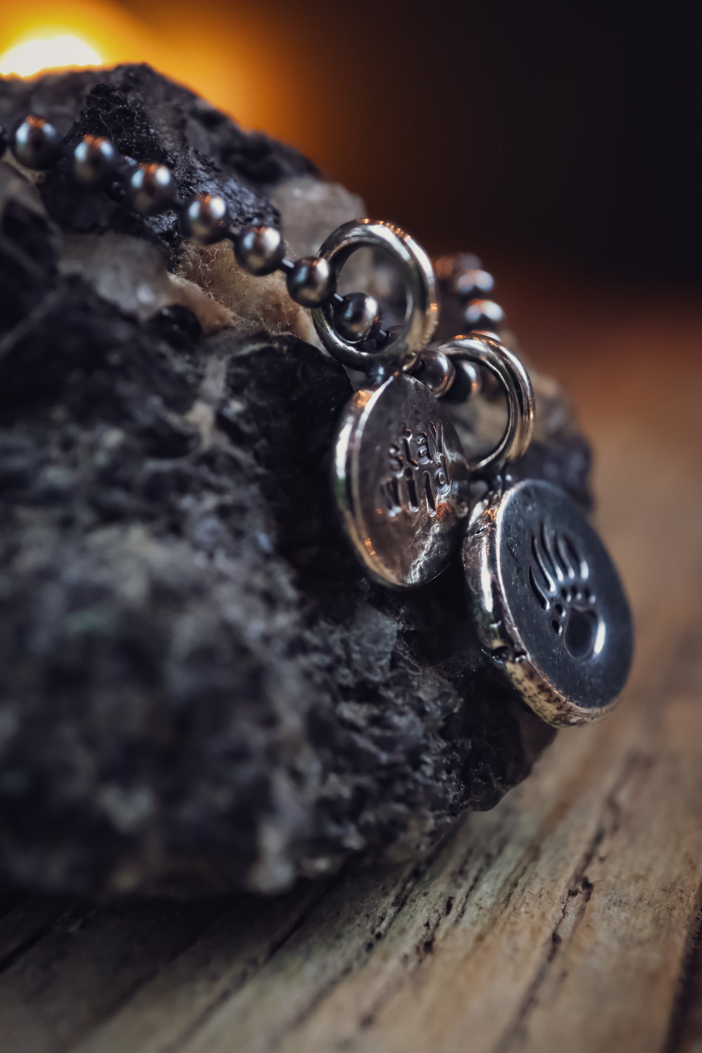 the Stay Wild Bear Track Necklace (reclaimed sterling silver)