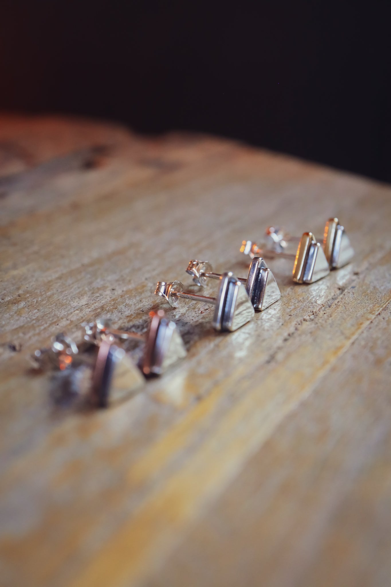 the Geo Mountain Earrings (copper + silver)