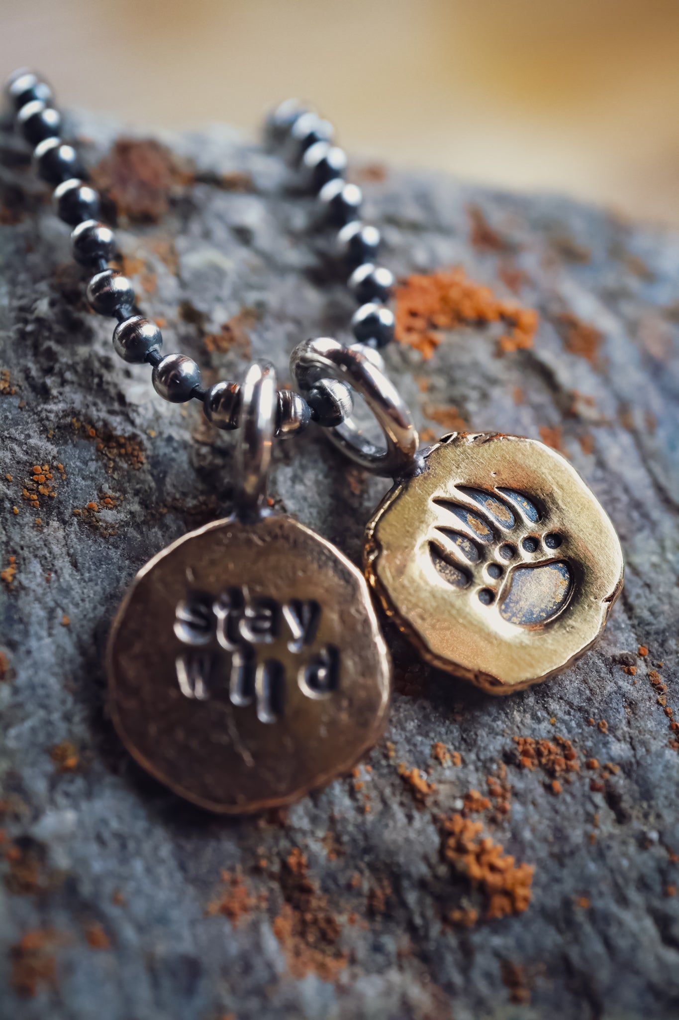 the Stay Wild Bear Track Necklace (brass)