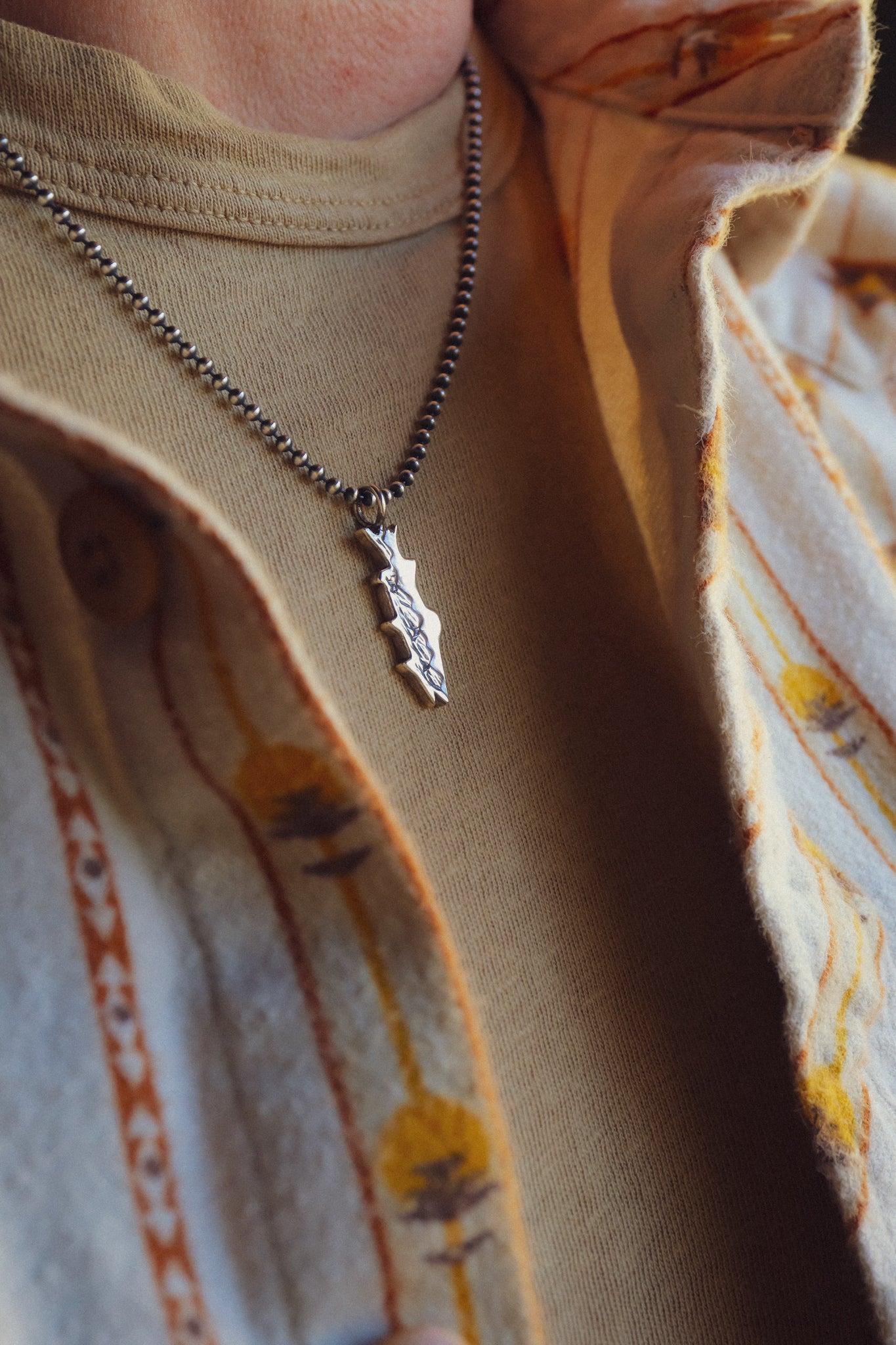 the Mountain Trout Necklace (brass + sterling silver)