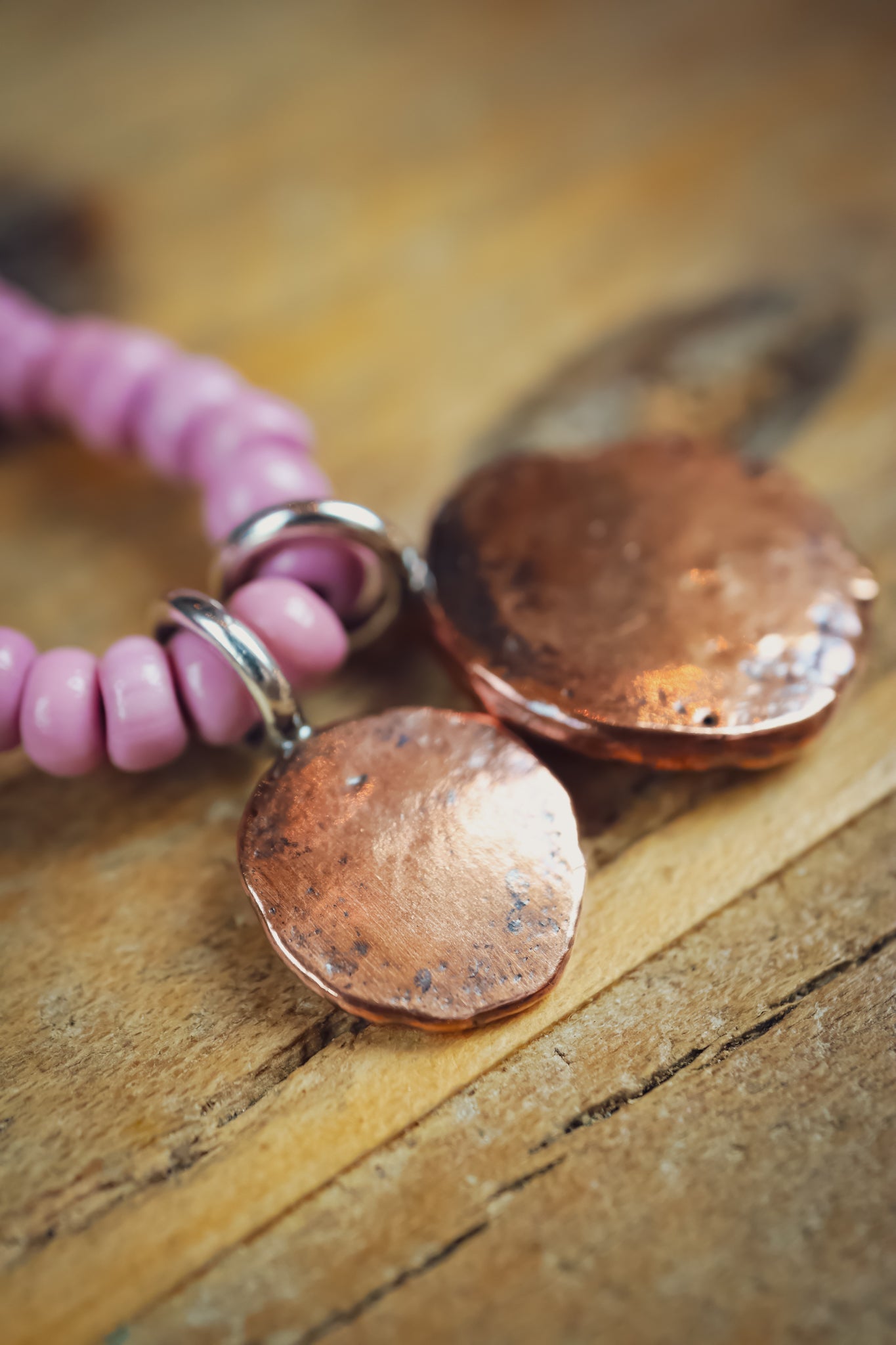 the Stay Wild Wolf Track Beaded Necklace (copper)