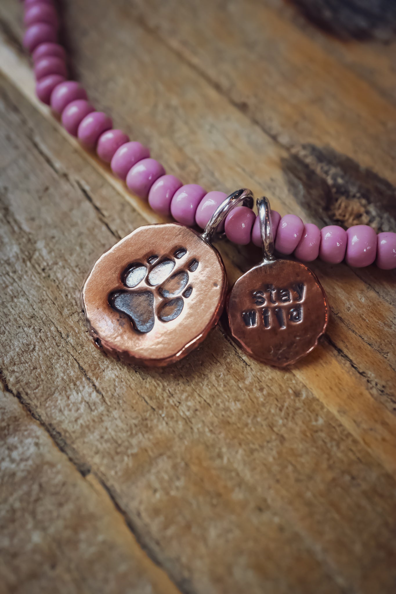 the Stay Wild Wolf Track Beaded Necklace (copper)