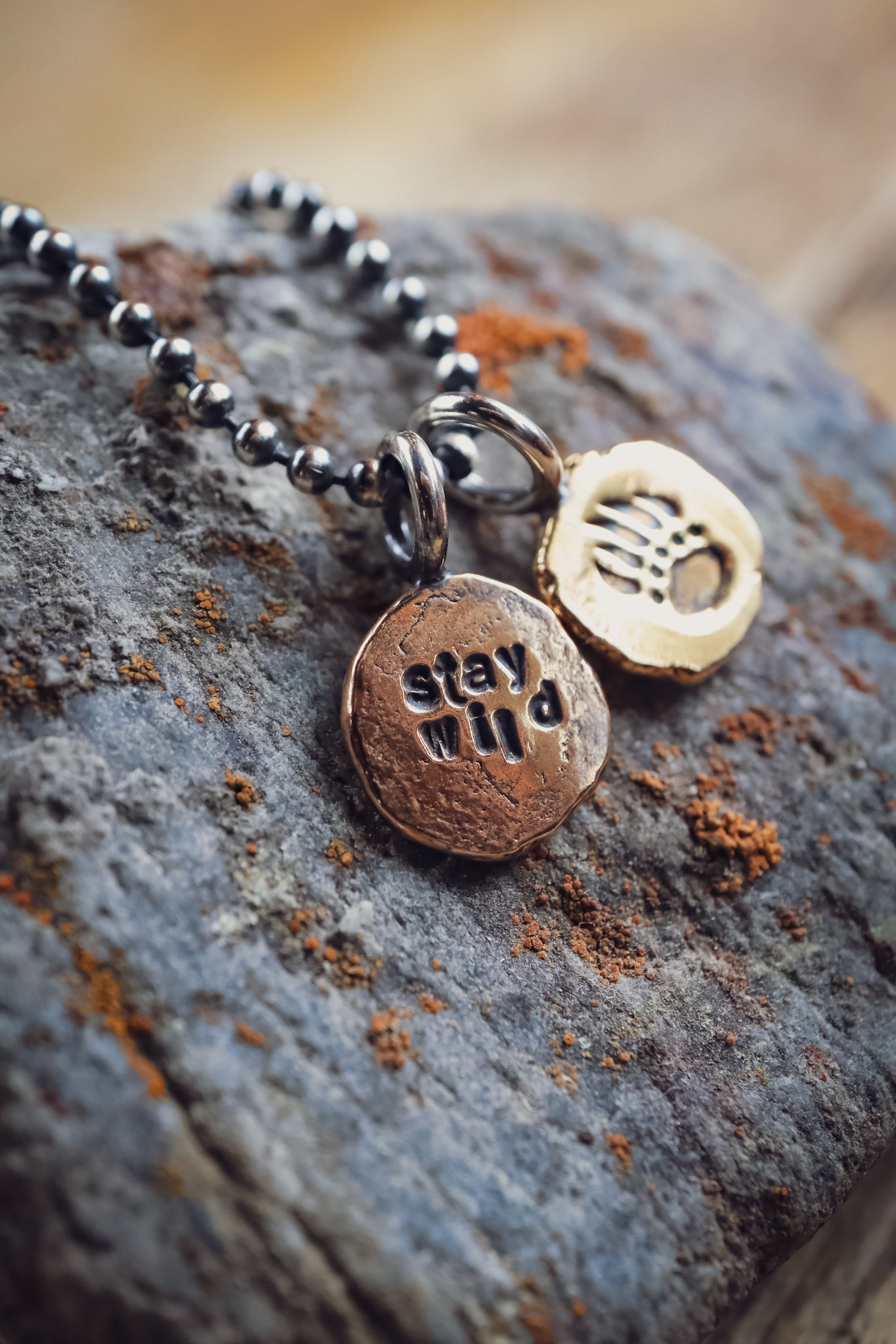 the Stay Wild Bear Track Necklace (brass)