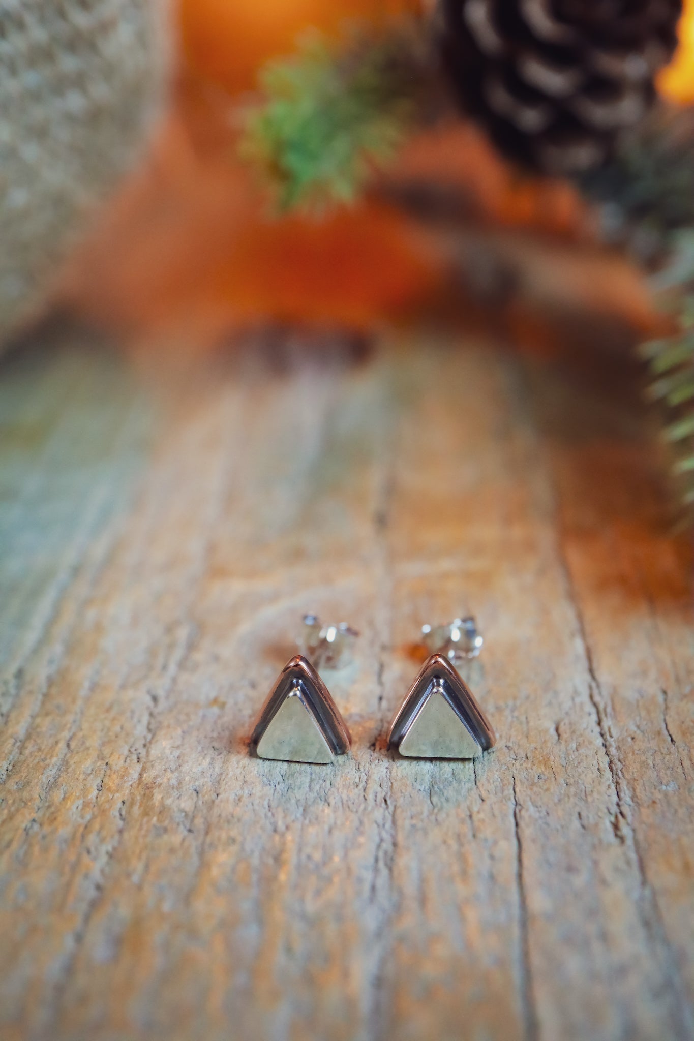 the Geo Mountain Earrings (copper + silver)