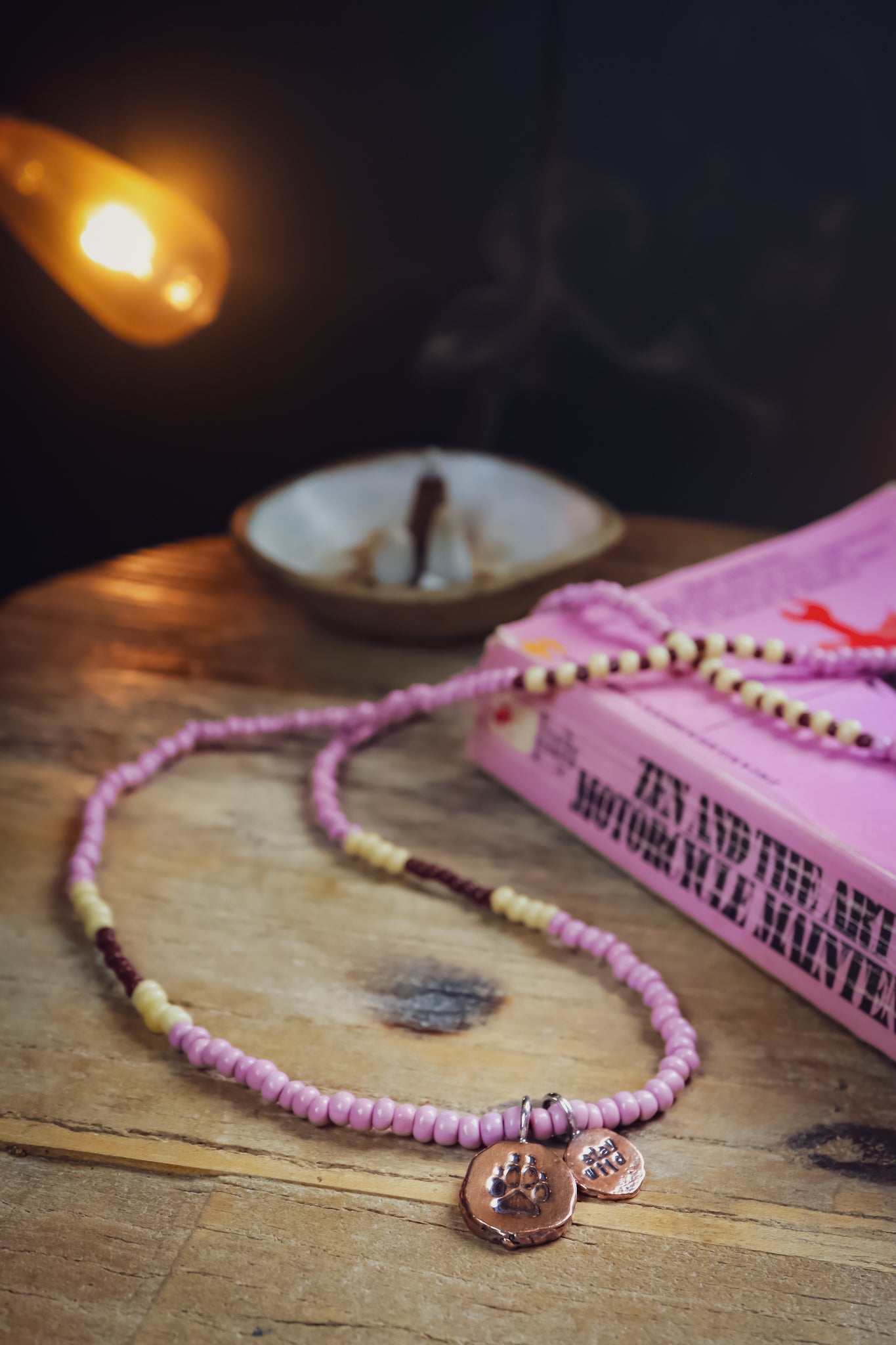 the Stay Wild Wolf Track Beaded Necklace (copper)