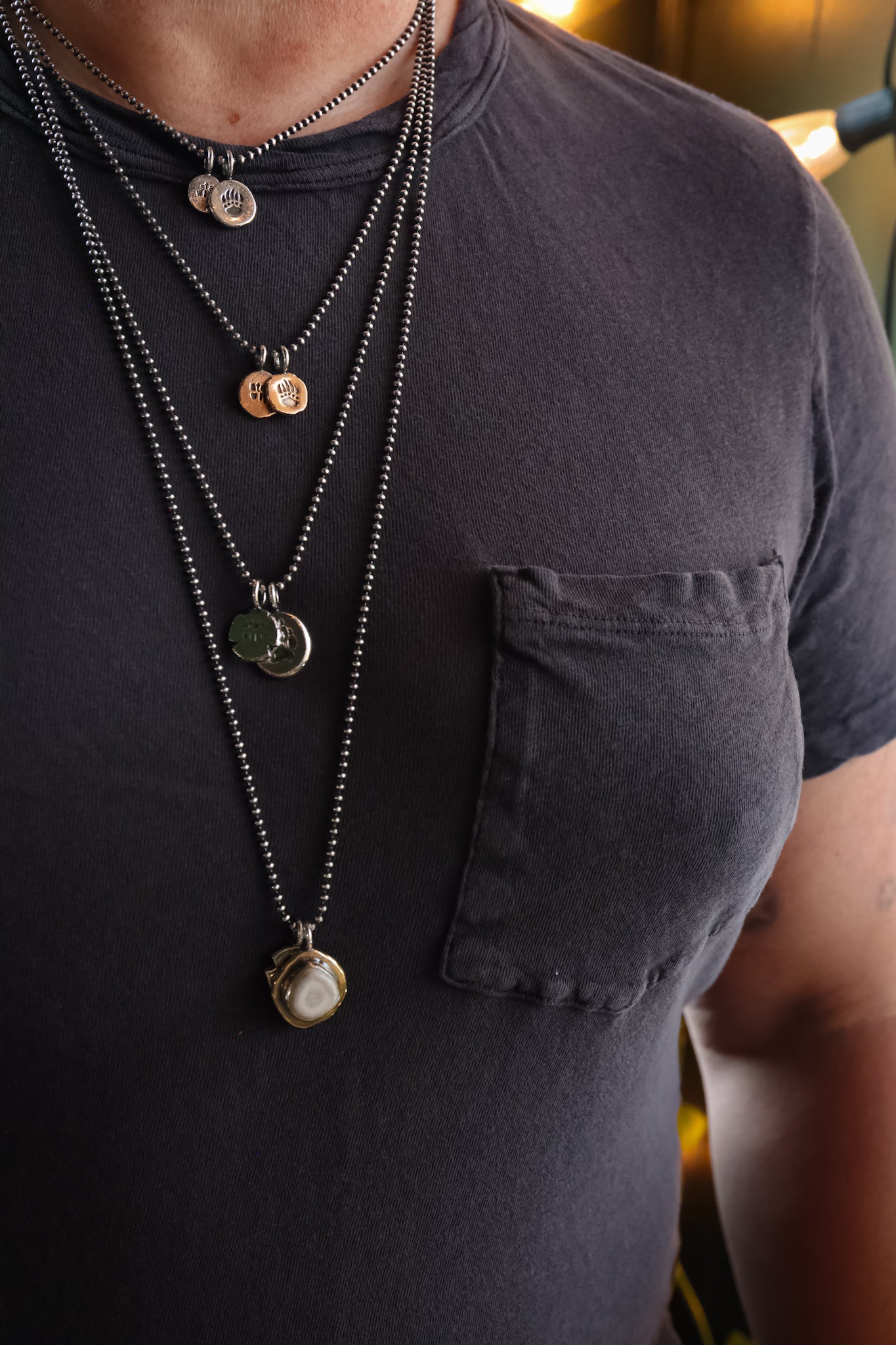 the Stay Wild Bear Track Necklace (brass)